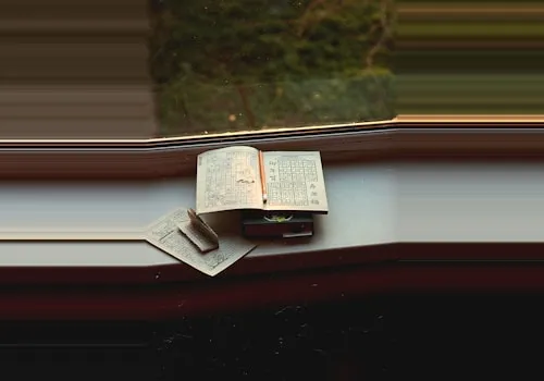 opened book on brown wooden table by John Morgan @ unsplash